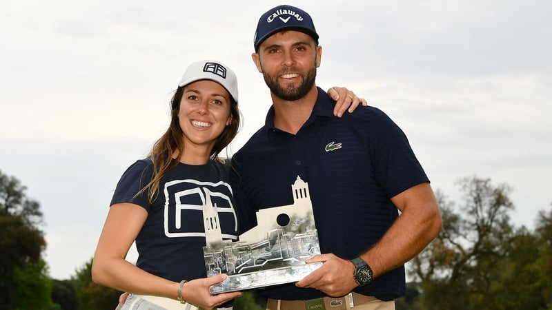 Adri Arnaus poses with girlfriend Cristina Casanella after winning the Catalunya Championship