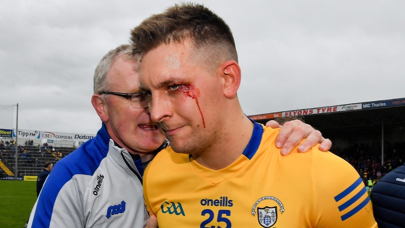 Brian Lohan with Aron Shanagher after the game