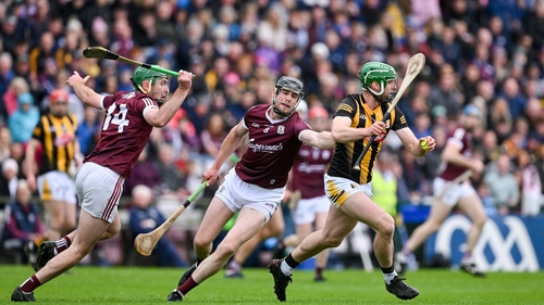 Tommy Walsh of Kilkenny breaks clear of Brian Concannon and Joseph Cooney