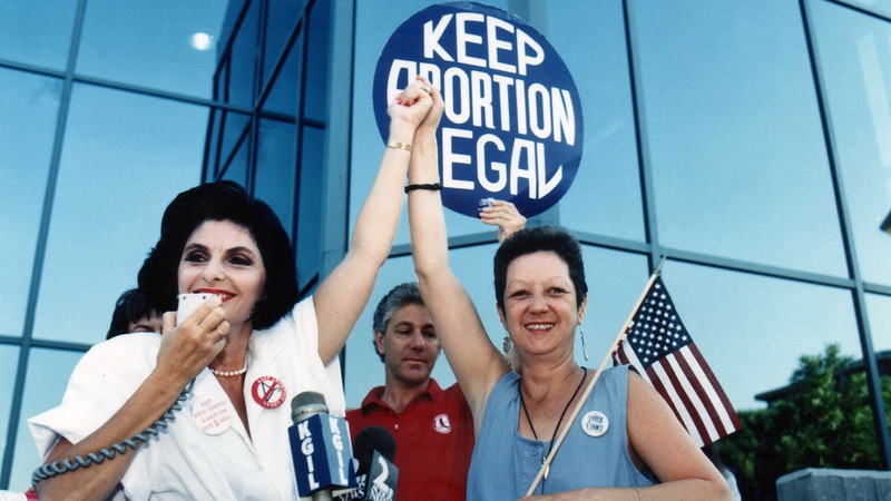 Norma McCorvey (right), known by the pseudonym "Jane Roe", was a single mother pregnant for the third time who wanted an abortion