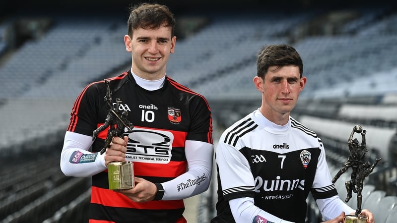 Dessie Hutchinson (L) and Eugene Branagan with their awards