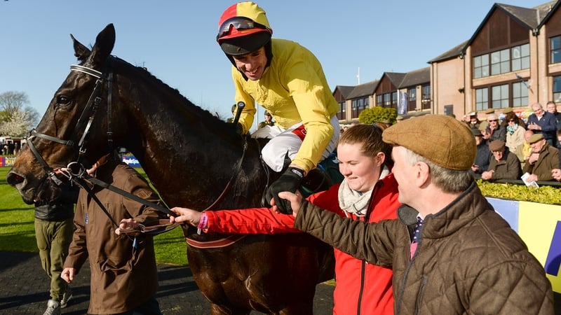 Derek O'Connor is congratulated by Robert Tyner after winning the Goffs Land Rover Bumper on Vision Des Flos in 2017