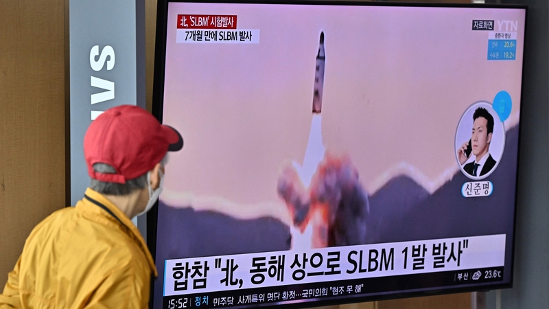 A news broadcast in Seoul shows file footage of a North Korean missile test