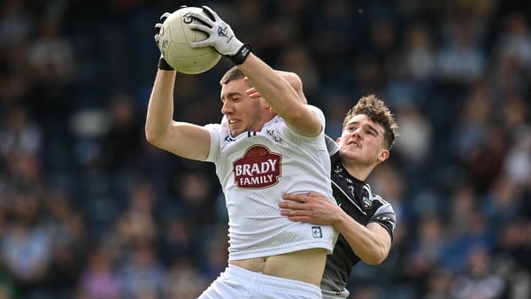 Daniel Lynam of Kildare claims a high ball ahead of Sligo's Canice Mulligan