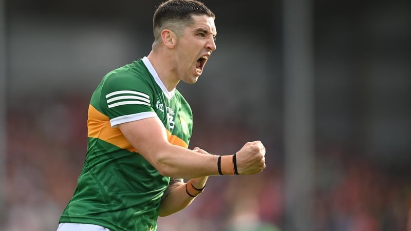 Kerry's Tony Brosnan celebrates scoring a point