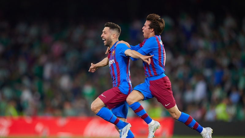 Jordi Alba celebrates after scoring Barcelona's late winner to book a Champions League spot