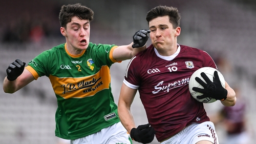 Finnian Ó Laoí challenged by Mark Diffley