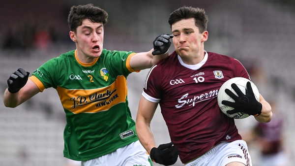 Finnian Ó Laoí challenged by Mark Diffley