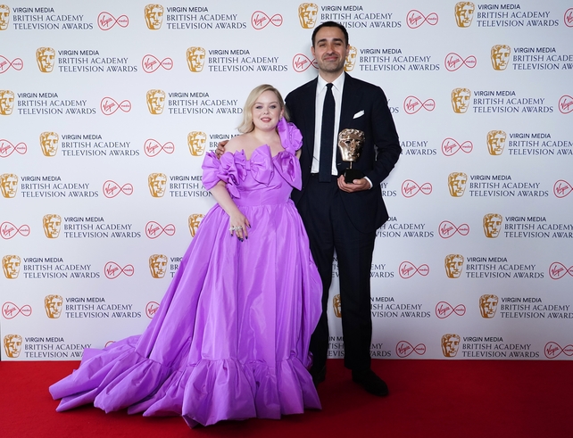 Nicola Coughlan presented Jamie Demetriou with the BAFTA TV award for Best Male in a Comedy for his role in Channel 4's Stath Lets Flats.