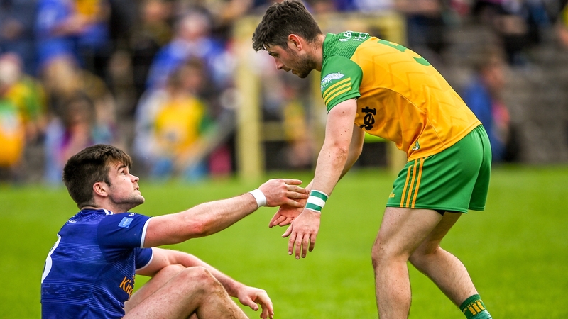 Ryan McHugh commiserates with Cavan's Thomas Galligan after the game