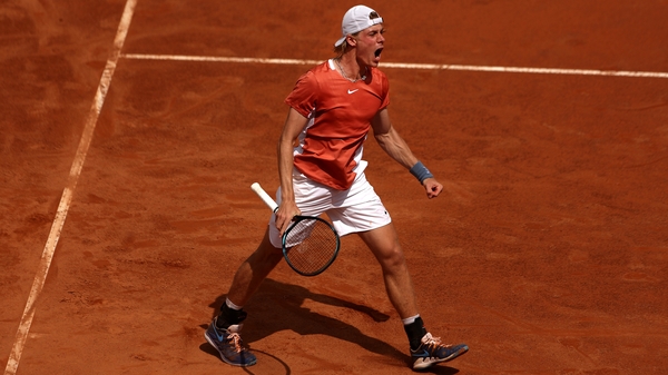 Denis Shapovalov celeberates winning the first set against Lorenzo Sonego