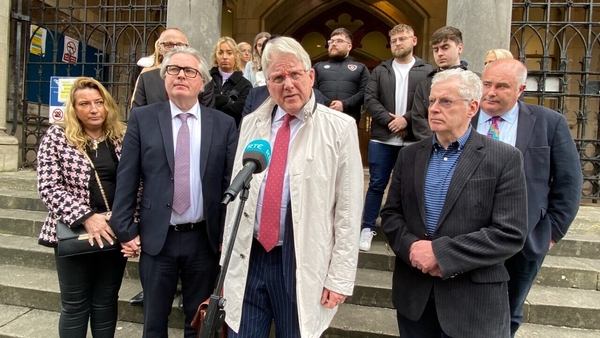 Barrister Damien Tansey with Jimmy Loughlin's family and friends