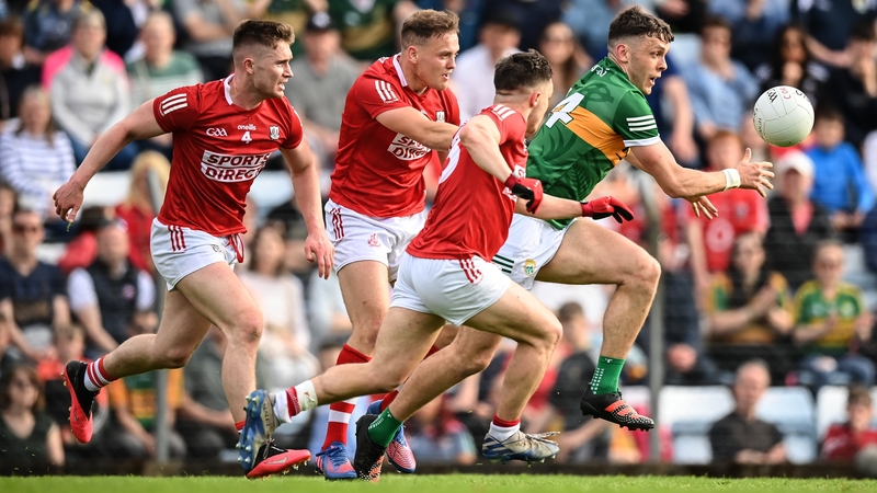 David Clifford is pursued by Cork players Kevin Flahive, Steven Sherlock and Sean Powter during the Munster semi-final
