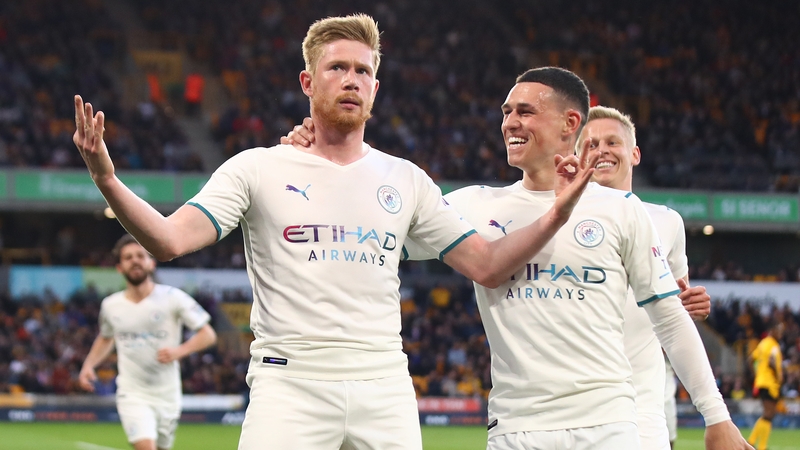 Manchester City could have 17 players at the World Cup, including Belgium's Kevin de Bruyne (L) and England's Phil Foden