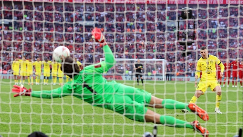 Mason Mount has his penalty kick by Liverpool goalkeeper Alisson Becker