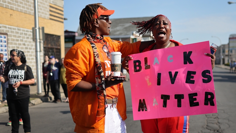 People gather outside Tops market today in Buffalo, New York
