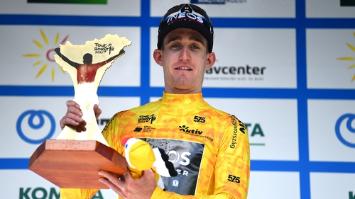 Eddie Dunbar with the trophy following his win in Hungary