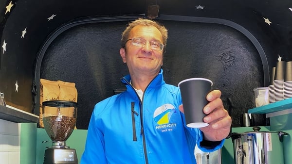 Aviars Harcenko making coffee in the Hard Ground coffee truck