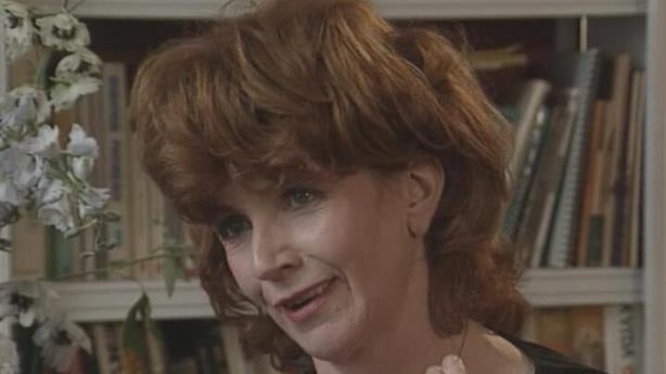 Edna O'Brien a woman with red hair in a bouffant