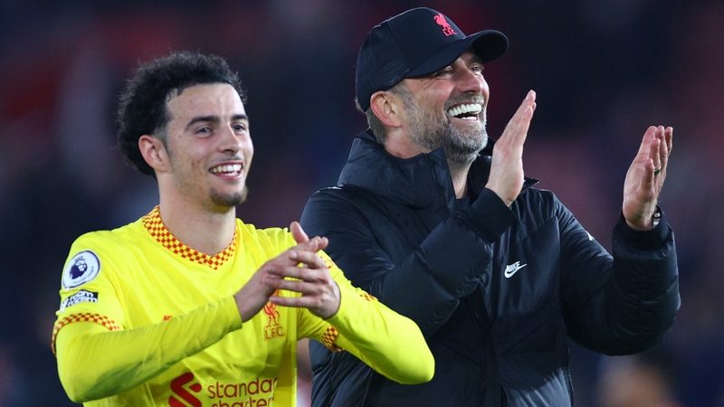 Curtis Jones and Klopp applaud the travelling fans at Sr Mary's