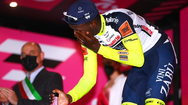 Biniam Girmay suffered the eye injury on the podium while attempting to uncork a bottle of prosecco on the podium