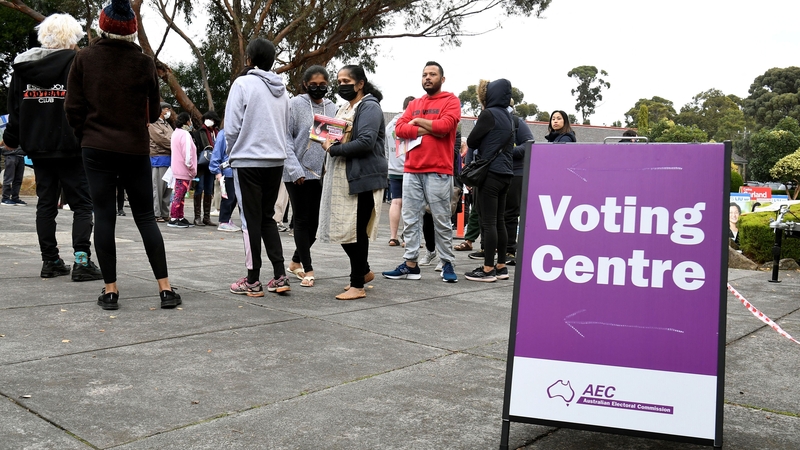 Voters queue at a pre-polling centre in the seat of Chisholm in Melbourne ahead of the general election on Saturday