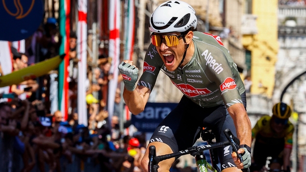Oldani celebrates as he crosses the finish line