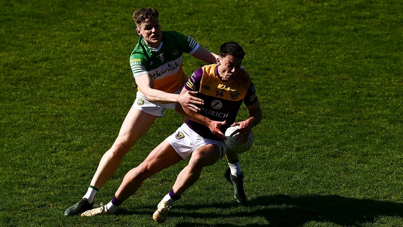 Eoghan Nolan of Wexford in action against Offaly's Johnny Moloney during the Leinster SFC match in April