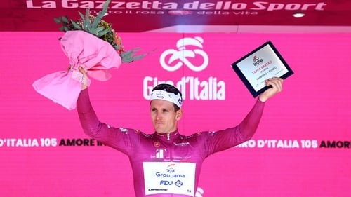 Arnaud Demare celebrates winning the purple points jersey