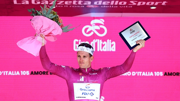 Arnaud Demare celebrates winning the purple points jersey