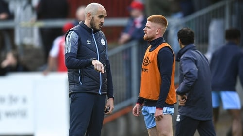 Shelbourne coach Joey O'Brien speaking to Aodh Dervin