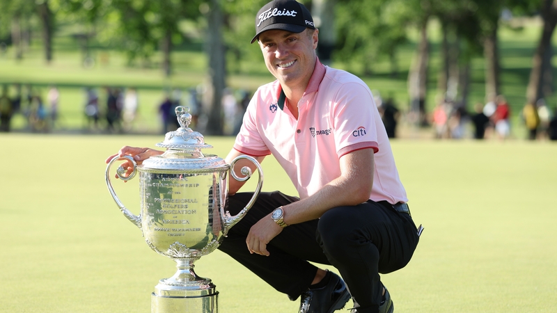 Justin Thomas poses with the Wanamaker Trophy after beating Will Zalatoris in a playoff