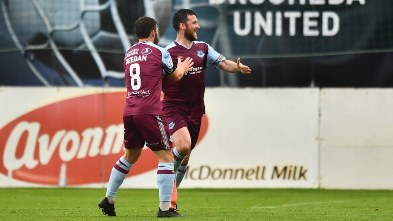 Ryan Brennan celebrates his matchwinner against the league leaders