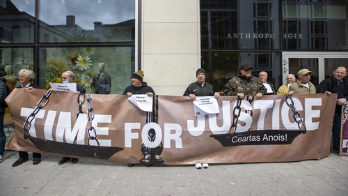 Demonstrators outside Britain's Northern Ireland Office headquarters in Belfast today