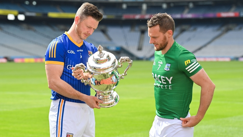 Mickey Quinn inspecting the Tailteann Cup alongside Fermanagh's Declan McCusker