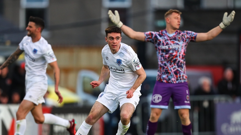 Dean Williams (centre) nipped in to equalise for Drogs