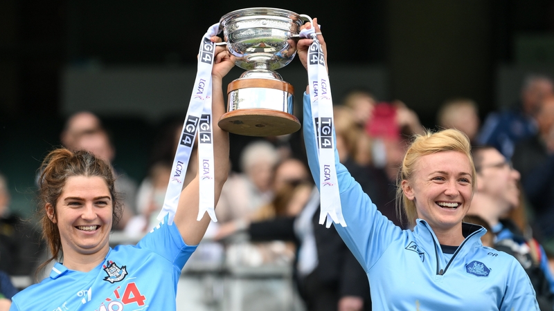 Niamh Collins and Carla Rowe lift the Mary Ramsbottom Cup