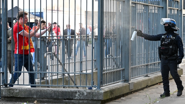 28 May: Police spray tear gas at Liverpool fans outside the Stade de France prior to the UEFA Champions League final