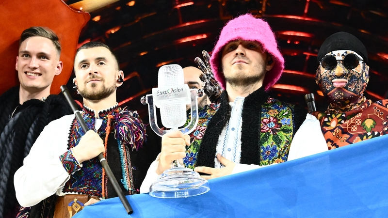 Kalush Orchestra with the crystal microphone trophy they sold to raise funds for the Ukrainian military.