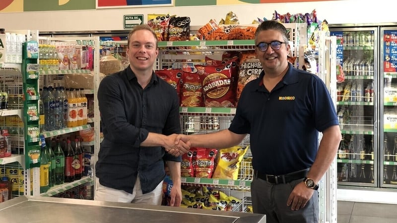 Tim Arits, CEO of Intouch.com, and Fernando Velasco, general manager of Mexico's Kiosko