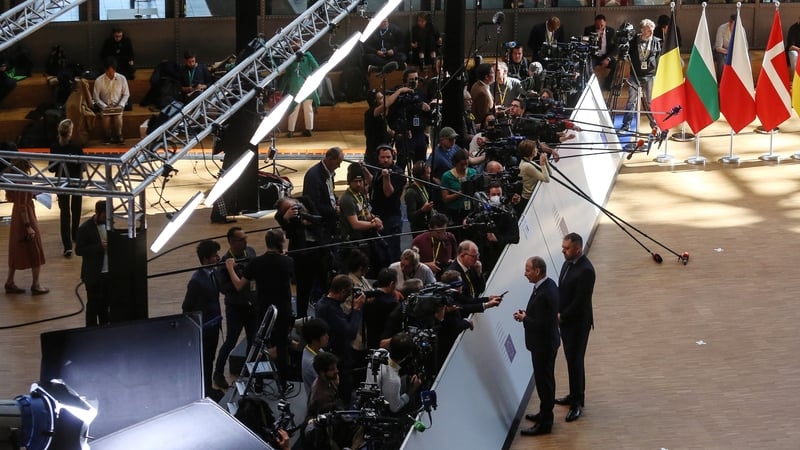 Micheál Martin speaks to the media on the second day of a special EU leaders summit at the European Council headquarters in Brussels, Belgium