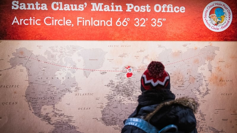 A tourist visits Santa Claus' hometown of Rovaniemi city in Lapland, Finland