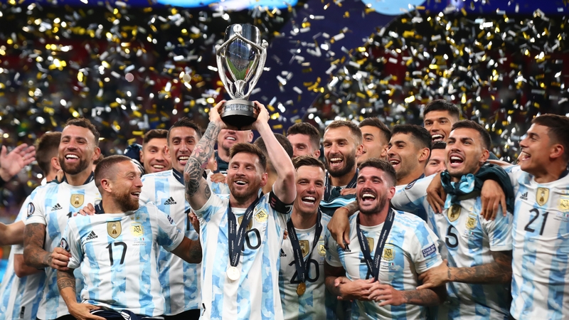 Lionel Messi lifts the trophy with his Argentina team-mates following their Finalissima victory