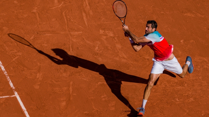 Marin Cilic plays a backhand