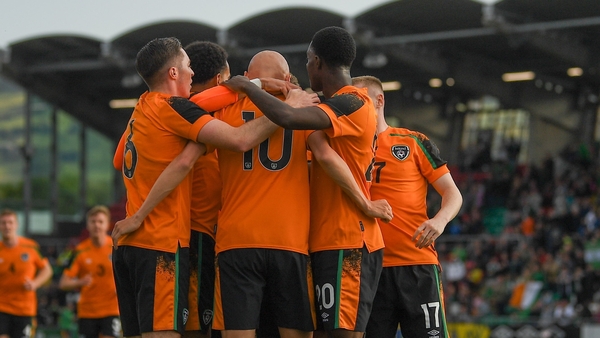 The Republic of Ireland players mob Will Smallbone after his opening goal