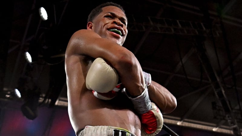 Devin Haney celebrates becoming the undisputed lightweight champion of the world in Melbourne