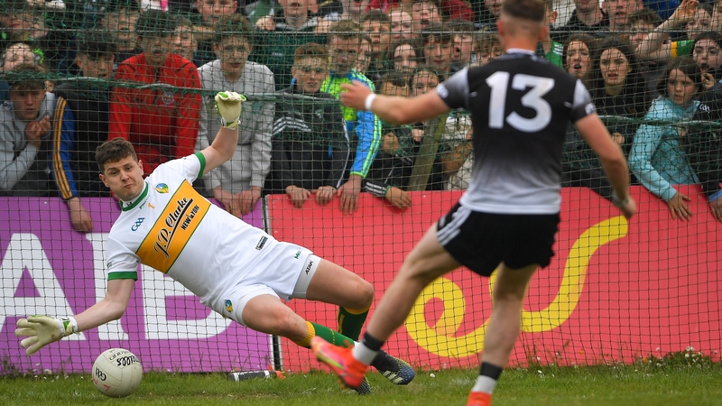 Alan Reilly beats Leitrim goalkeeper Brendan Flynn during the penalty shootout