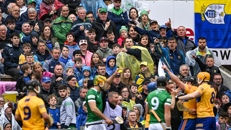 Limerick and Clare fans watch the action at Semple Stadium