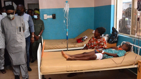 State officials visit injured victims on hospital beds following the attack