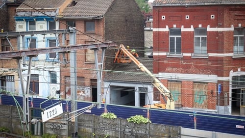 The rundown cluster of buildings is in the city of Charleroi